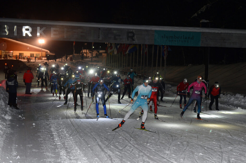 Night Race Start: Two-person teams start the inaugural Birkie night race in 2023.